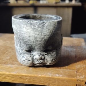 Doll head planters/ holder (cement)